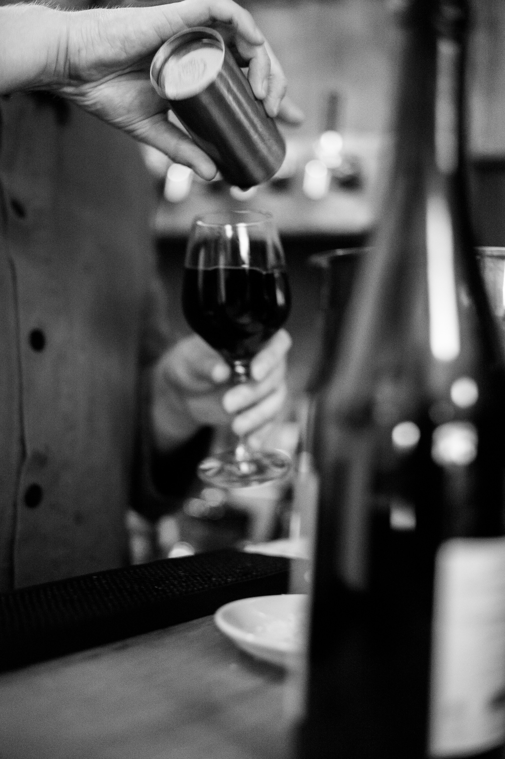 Red wine being poured into a glass
